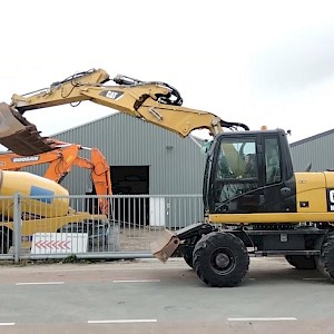 Caterpillar M313D, bj 2011, 7 592 uur